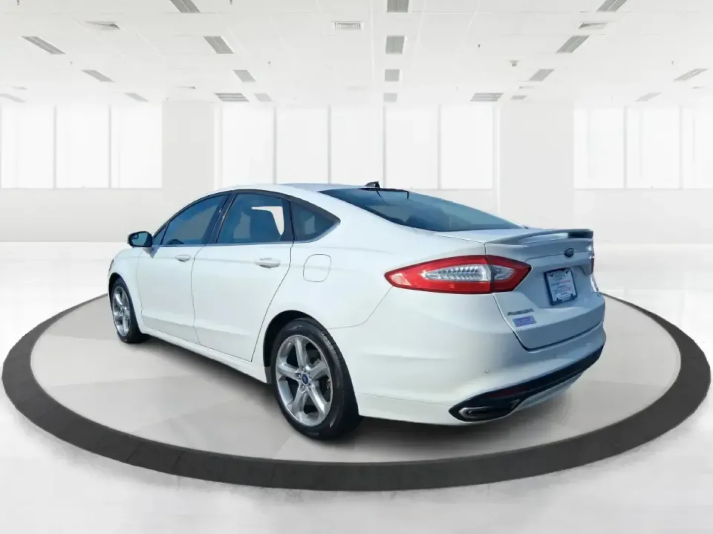 2016 Ford Fusion SE (3FA6P0H91GR) with an 2.0L L4 DOHC 16V engine, 6-Speed Automatic transmission, located at 880 E. National Road, Vandalia, OH, 45377, (937) 908-9800, 39.891918, -84.183594 - Need a dependable commuter that can handle I75 traffic, school drop-offs, and weekend runs to Dayton without draining your budget? This 2016 Ford Fusion SE in Oxford White is the kind of practical, comfortable sedan that fits real life in Vandalia-smooth for daily driving, efficient on regular unlea - Photo#4