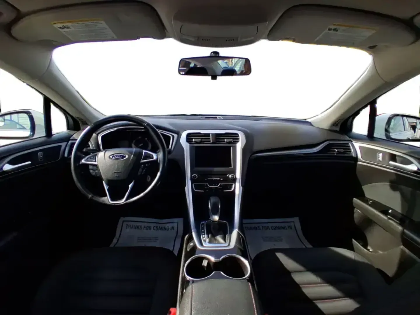 2016 Ford Fusion SE (3FA6P0H91GR) with an 2.0L L4 DOHC 16V engine, 6-Speed Automatic transmission, located at 880 E. National Road, Vandalia, OH, 45377, (937) 908-9800, 39.891918, -84.183594 - Need a dependable commuter that can handle I75 traffic, school drop-offs, and weekend runs to Dayton without draining your budget? This 2016 Ford Fusion SE in Oxford White is the kind of practical, comfortable sedan that fits real life in Vandalia-smooth for daily driving, efficient on regular unlea - Photo#21