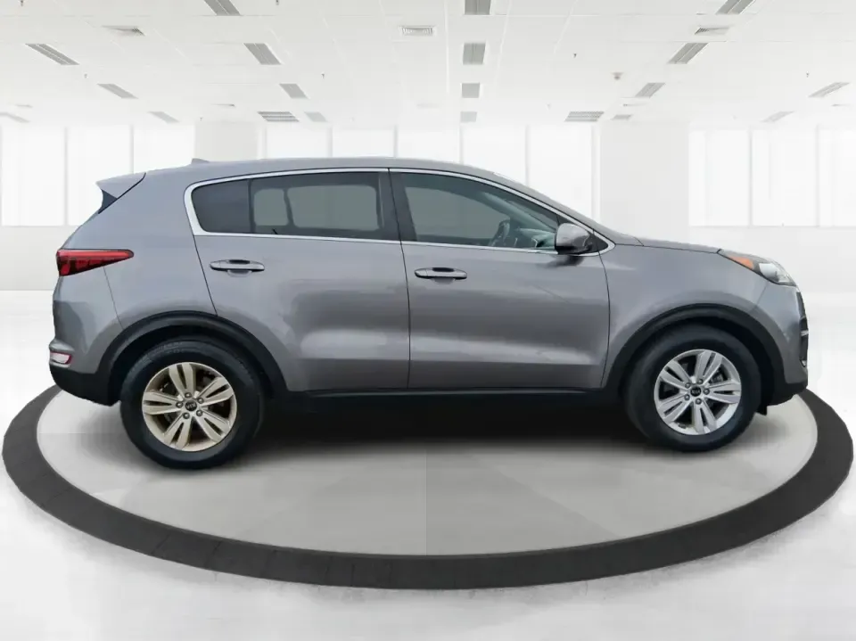 2018 Kia Sportage LX (KNDPM3AC0J7) with an Theta II 2.4L I-4 gasoline direct injection engine, 6A transmission, located at 1099 N County Rd 25A, Troy, OH, 45373, (937) 908-9800, 40.057079, -84.212883 - Weekend road trips to the Miami County Fair, daily commutes down I75, or quick errands between Downtown Troy and the shops near West Main Street-this 2018 Kia Sportage LX is the kind of compact SUV that fits real life. With its versatile crossover layout, confident road manners, and smart cargo spac - Photo#1