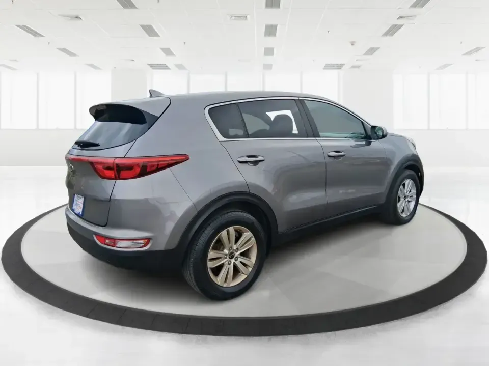 2018 Kia Sportage LX (KNDPM3AC0J7) with an Theta II 2.4L I-4 gasoline direct injection engine, 6A transmission, located at 1099 N County Rd 25A, Troy, OH, 45373, (937) 908-9800, 40.057079, -84.212883 - Weekend road trips to the Miami County Fair, daily commutes down I75, or quick errands between Downtown Troy and the shops near West Main Street-this 2018 Kia Sportage LX is the kind of compact SUV that fits real life. With its versatile crossover layout, confident road manners, and smart cargo spac - Photo#2