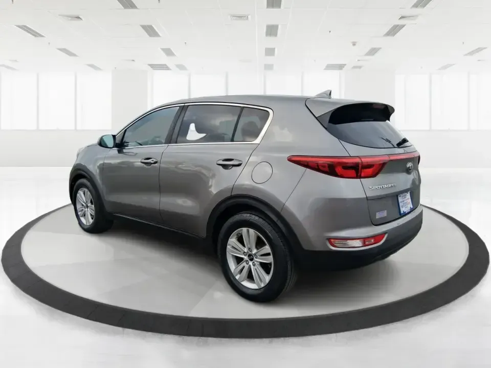2018 Kia Sportage LX (KNDPM3AC0J7) with an Theta II 2.4L I-4 gasoline direct injection engine, 6A transmission, located at 1099 N County Rd 25A, Troy, OH, 45373, (937) 908-9800, 40.057079, -84.212883 - Weekend road trips to the Miami County Fair, daily commutes down I75, or quick errands between Downtown Troy and the shops near West Main Street-this 2018 Kia Sportage LX is the kind of compact SUV that fits real life. With its versatile crossover layout, confident road manners, and smart cargo spac - Photo#4