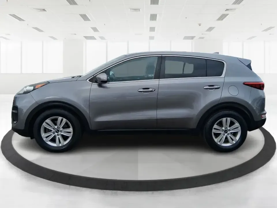 2018 Kia Sportage LX (KNDPM3AC0J7) with an Theta II 2.4L I-4 gasoline direct injection engine, 6A transmission, located at 1099 N County Rd 25A, Troy, OH, 45373, (937) 908-9800, 40.057079, -84.212883 - Weekend road trips to the Miami County Fair, daily commutes down I75, or quick errands between Downtown Troy and the shops near West Main Street-this 2018 Kia Sportage LX is the kind of compact SUV that fits real life. With its versatile crossover layout, confident road manners, and smart cargo spac - Photo#5