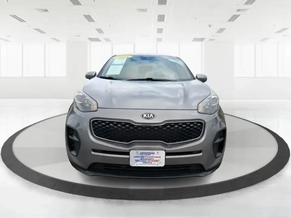 2018 Kia Sportage LX (KNDPM3AC0J7) with an Theta II 2.4L I-4 gasoline direct injection engine, 6A transmission, located at 1099 N County Rd 25A, Troy, OH, 45373, (937) 908-9800, 40.057079, -84.212883 - Weekend road trips to the Miami County Fair, daily commutes down I75, or quick errands between Downtown Troy and the shops near West Main Street-this 2018 Kia Sportage LX is the kind of compact SUV that fits real life. With its versatile crossover layout, confident road manners, and smart cargo spac - Photo#7