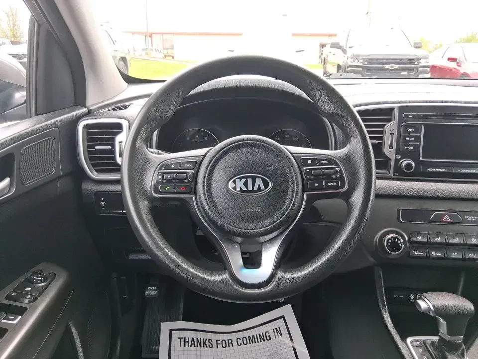 2018 Kia Sportage LX (KNDPM3AC0J7) with an Theta II 2.4L I-4 gasoline direct injection engine, 6A transmission, located at 1099 N County Rd 25A, Troy, OH, 45373, (937) 908-9800, 40.057079, -84.212883 - Weekend road trips to the Miami County Fair, daily commutes down I75, or quick errands between Downtown Troy and the shops near West Main Street-this 2018 Kia Sportage LX is the kind of compact SUV that fits real life. With its versatile crossover layout, confident road manners, and smart cargo spac - Photo#16