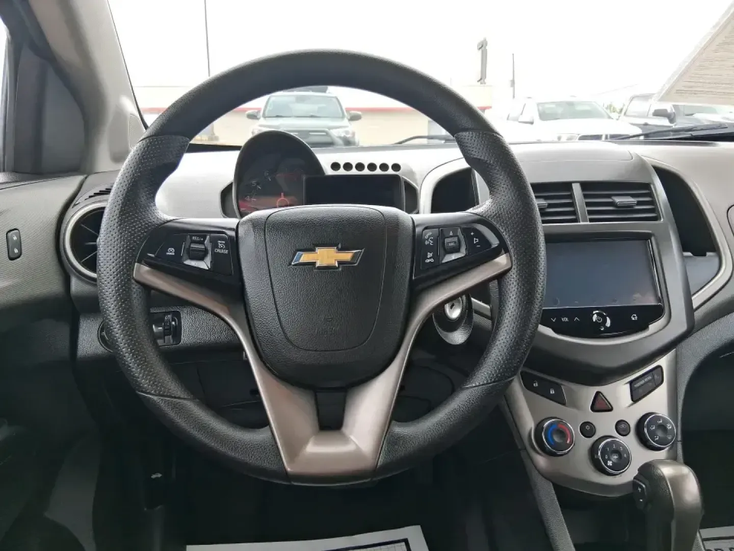 2014 Chevrolet Sonic LT Auto (1G1JC6SH7E4) with an 1.8L L4 DOHC 24V engine, 6-Speed Automatic transmission, located at 1230 East Main St, Xenia, OH, 45385, (937) 908-9800, 39.688026, -83.910172 - Need a smart, easy-to-park commuter that still has room for grocery runs, school backpacks, and weekend getaways to Dayton or the Miami Valley? This 2014 Chevrolet Sonic LT Auto Hatchback delivers the kind of real-world versatility that fits everyday life in Troy-zippy around town, efficient for lon - Photo#16