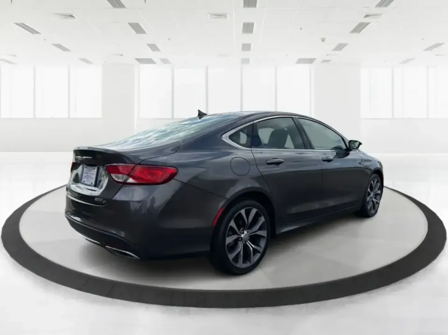 2015 Chrysler 200 C (1C3CCCCG7FN) with an 3.6L V6 DOHC 24V FFV engine, 9-Speed Automatic transmission, located at 880 E. National Road, Vandalia, OH, 45377, (937) 908-9800, 39.891918, -84.183594 - Set up for real life in the Miami Valley-school drop-offs, a long commute down I75, and comfortable weekend getaways-this 2015 Chrysler 200 C is the kind of midsize sedan that fits a busy schedule without feeling basic. With its smooth ride, strong V6 power, and upscale comfort features, it's a smar - Photo#2