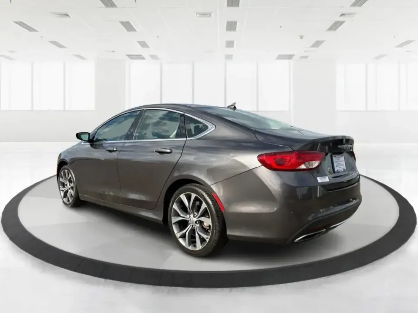 2015 Chrysler 200 C (1C3CCCCG7FN) with an 3.6L V6 DOHC 24V FFV engine, 9-Speed Automatic transmission, located at 880 E. National Road, Vandalia, OH, 45377, (937) 908-9800, 39.891918, -84.183594 - Set up for real life in the Miami Valley-school drop-offs, a long commute down I75, and comfortable weekend getaways-this 2015 Chrysler 200 C is the kind of midsize sedan that fits a busy schedule without feeling basic. With its smooth ride, strong V6 power, and upscale comfort features, it's a smar - Photo#4