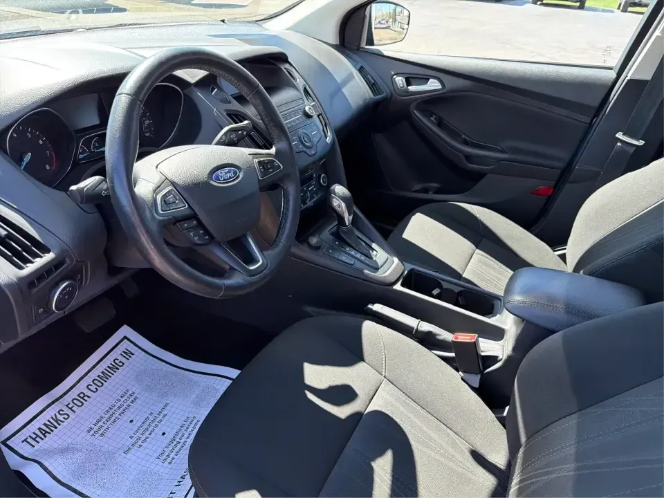 2018 Ford Focus SE (1FADP3FE5JL) with an 1.0L L3 engine, Automatic transmission, located at 1230 East Main St, Xenia, OH, 45385, (937) 908-9800, 39.688026, -83.910172 - Need a smart, budget-friendly commuter that's easy to live with all week and still ready for a spontaneous weekend escape? This 2018 Ford Focus SE sedan in eye-catching Lightning Blue Metallic is a practical pick for daily drives to Dayton, school drop-offs, and quick errands around Xenia-while keep - Photo#9