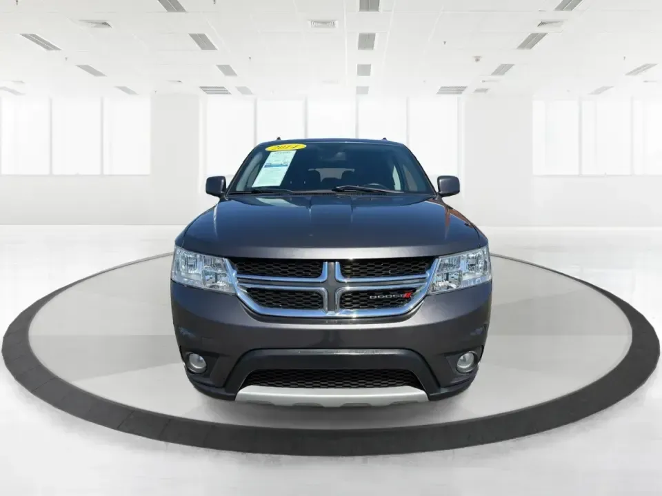 2014 Dodge Journey SXT (3C4PDDBG0ET) with an 3.6L V-6 DOHC engine, 6-Speed Automatic transmission, located at 1099 N County Rd 25A, Troy, OH, 45373, (937) 908-9800, 40.057079, -84.212883 - Pack up the kids, the dog, and the weekend bags-this 2014 Dodge Journey SXT is the kind of SUV that makes everyday life in Troy easier and spontaneous road trips feel completely doable. Whether you're tackling school drop-offs, commuting to Dayton, or planning a family day at the Miami County Fairgr - Photo#7