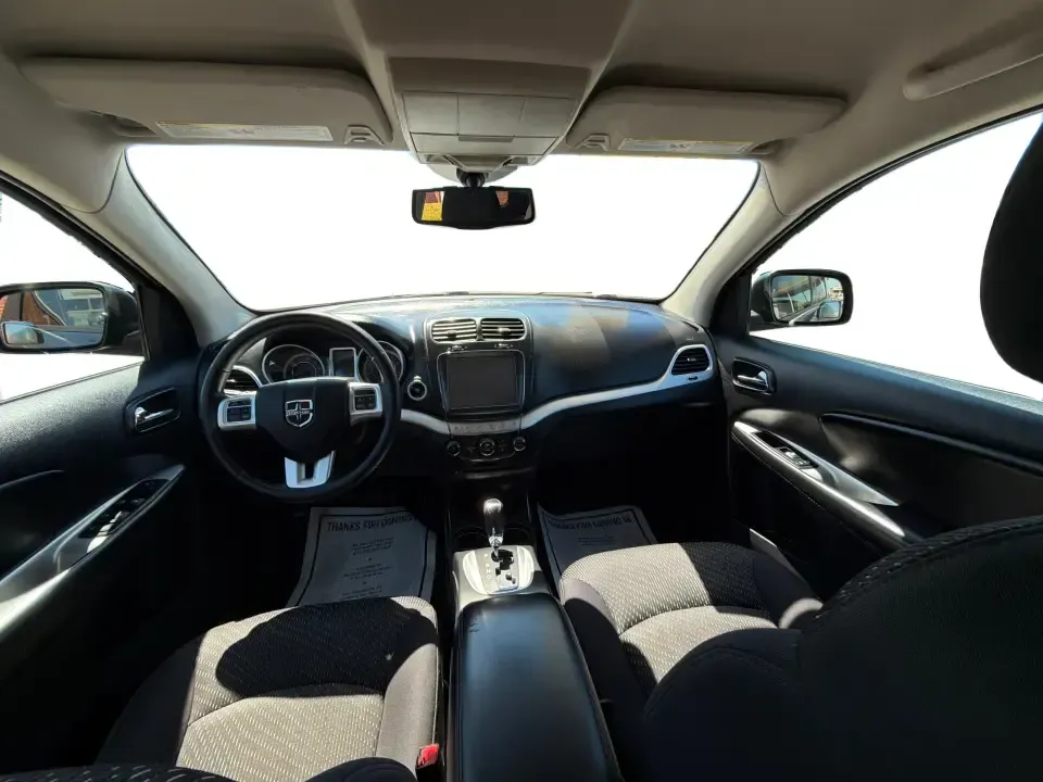 2014 Dodge Journey SXT (3C4PDDBG0ET) with an 3.6L V-6 DOHC engine, 6-Speed Automatic transmission, located at 1099 N County Rd 25A, Troy, OH, 45373, (937) 908-9800, 40.057079, -84.212883 - Pack up the kids, the dog, and the weekend bags-this 2014 Dodge Journey SXT is the kind of SUV that makes everyday life in Troy easier and spontaneous road trips feel completely doable. Whether you're tackling school drop-offs, commuting to Dayton, or planning a family day at the Miami County Fairgr - Photo#21