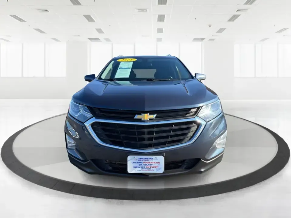2018 Chevrolet Equinox LT (3GNAXSEV1JL) with an 1.5L I-4 gasoline direct injection engine, 6A transmission, located at 8750 N County Rd 25A, Piqua, OH, 45356, (937) 908-9800, 40.164391, -84.232513 - Picture your next Ohio road trip: a comfortable SUV loaded with gear, the kids settled in, and the confidence to keep going when the weather turns or the route heads off the main road. This 2018 Chevrolet Equinox LT in Storm Blue Metallic is built for real life in and around Piqua-whether you're com - Photo#7