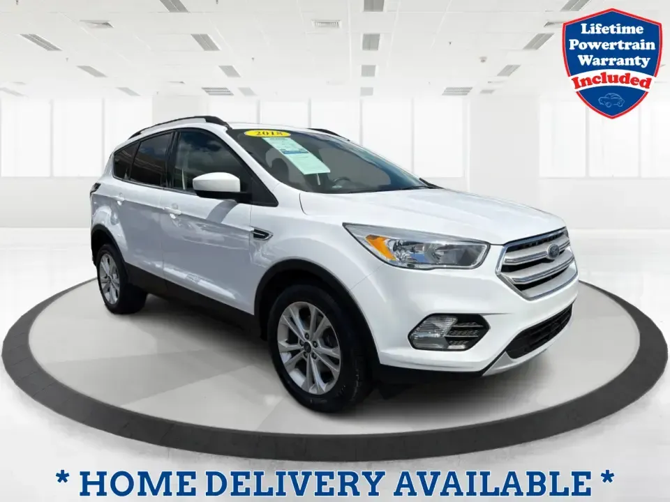 2018 Ford Escape SE (1FMCU0GD2JU) with an 1.5L L4 DOHC 16V engine, 6A transmission, located at 1951 S Dayton Lakeview Rd., New Carlisle, OH, 45344, (937) 908-9800, 39.890999, -84.050255 - Picture your next easy-to-live-with SUV: something that handles weekday commutes down I70, last-minute grocery runs near Brandt Pike, and weekend getaways to Buck Creek State Park without draining your budget. This 2018 Ford Escape SE is built for real life in Clark County-comfortable, efficient, an - Photo#0