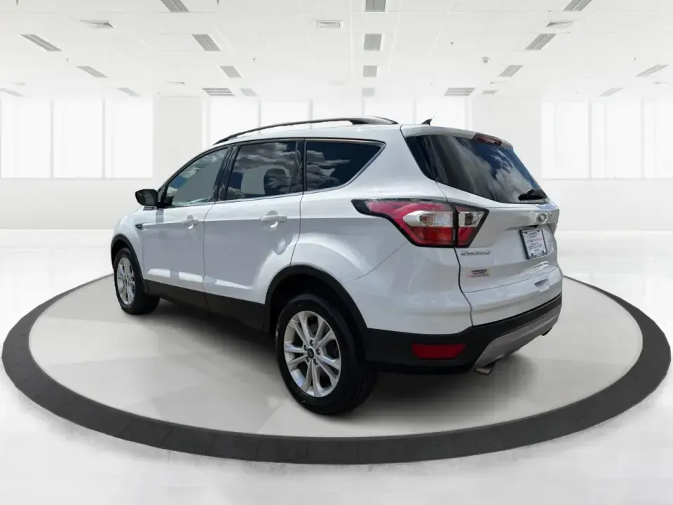 2018 Ford Escape SE (1FMCU0GD2JU) with an 1.5L L4 DOHC 16V engine, 6A transmission, located at 1951 S Dayton Lakeview Rd., New Carlisle, OH, 45344, (937) 908-9800, 39.890999, -84.050255 - Picture your next easy-to-live-with SUV: something that handles weekday commutes down I70, last-minute grocery runs near Brandt Pike, and weekend getaways to Buck Creek State Park without draining your budget. This 2018 Ford Escape SE is built for real life in Clark County-comfortable, efficient, an - Photo#4