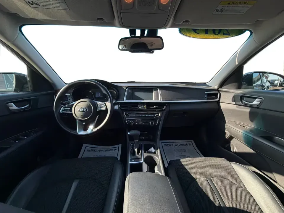 2019 Kia Optima S (5XXGT4L37KG) with an Theta II 2.4L I-4 gasoline direct injection engine, 6A transmission, located at 1099 N County Rd 25A, Troy, OH, 45373, (937) 908-9800, 40.057079, -84.212883 - Need a reliable commuter that still feels stylish for date night downtown, comfortable for weekend trips to Dayton, and efficient for the daily run up I75? This 2019 Kia Optima S in Ebony Black is a smart, budget-friendly sedan that fits real life-whether you're clocking a long work commute, shuttli - Photo#20