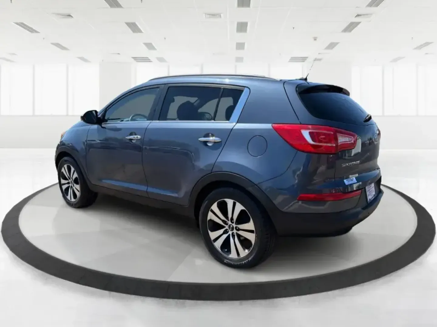 2012 Kia Sportage EX (KNDPC3A28C7) with an 2.4L I-4 DOHC engine, 6-Speed Automatic transmission, located at 880 E. National Road, Vandalia, OH, 45377, (937) 908-9800, 39.891918, -84.183594 - Picture your next week done right: an easy commute down I75, quick school drop-offs, a grocery run in the rain, and a spontaneous weekend trip to Taylorsville MetroPark-all in a compact SUV that feels comfortable, confident, and practical. This 2012 Kia Sportage EX in Twilight Blue is a smart fit fo - Photo#4