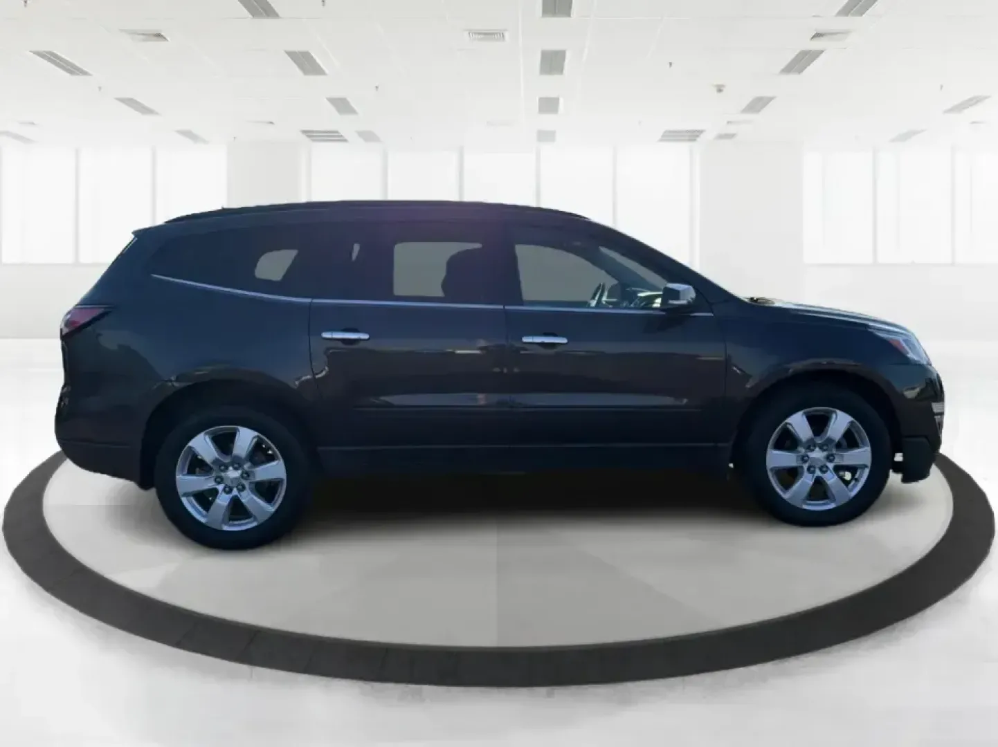2017 Chevrolet Traverse 1LT (1GNKRGKD6HJ) with an 3.6L V-6 gasoline direct injection engine, 6A transmission, located at 8750 N County Rd 25A, Piqua, OH, 45356, (937) 908-9800, 40.164391, -84.232513 - Road trips to Indian Lake, busy school mornings, and comfortable daily commutes down I75 are exactly what this SUV was built for. If you need a three-row family hauler that still feels confident and composed on Ohio back roads, this **2017 Chevrolet Traverse 1LT** in **Tungsten Metallic** delivers t - Photo#1