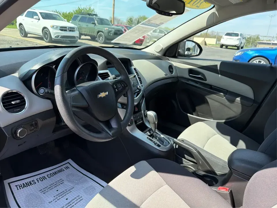 2013 Chevrolet Cruze LS Auto (1G1PA5SG2D7) with an ECOTEC 1.8L I-4 DOHC engine, 6-Speed Automatic transmission, located at 1230 East Main St, Xenia, OH, 45385, (937) 908-9800, 39.688026, -83.910172 - Need a dependable commuter that sips fuel, fits into tight downtown parking, and still feels comfortable for weekend errands and road trips? This 2013 Chevrolet Cruze LS Auto is a smart, budget-friendly sedan for life in and around Xenia-whether you're commuting toward Dayton, heading to Wright-Patt - Photo#9