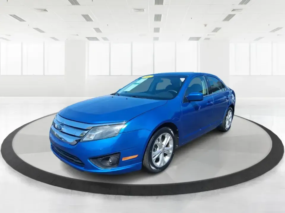 2012 Ford Fusion SE (3FAHP0HAXCR) with an 2.5L L4 DOHC 16V engine, located at 1099 N County Rd 25A, Troy, OH, 45373, (937) 908-9800, 40.057079, -84.212883 - Need a dependable sedan that makes everyday life easier-whether you're commuting down I-75 to Dayton, running errands around Troy, or planning a weekend drive past the Miami River and downtown's shops and festivals? This 2012 Ford Fusion SE in Blue Flame Metallic is a smart, comfortable choice for b - Photo#8