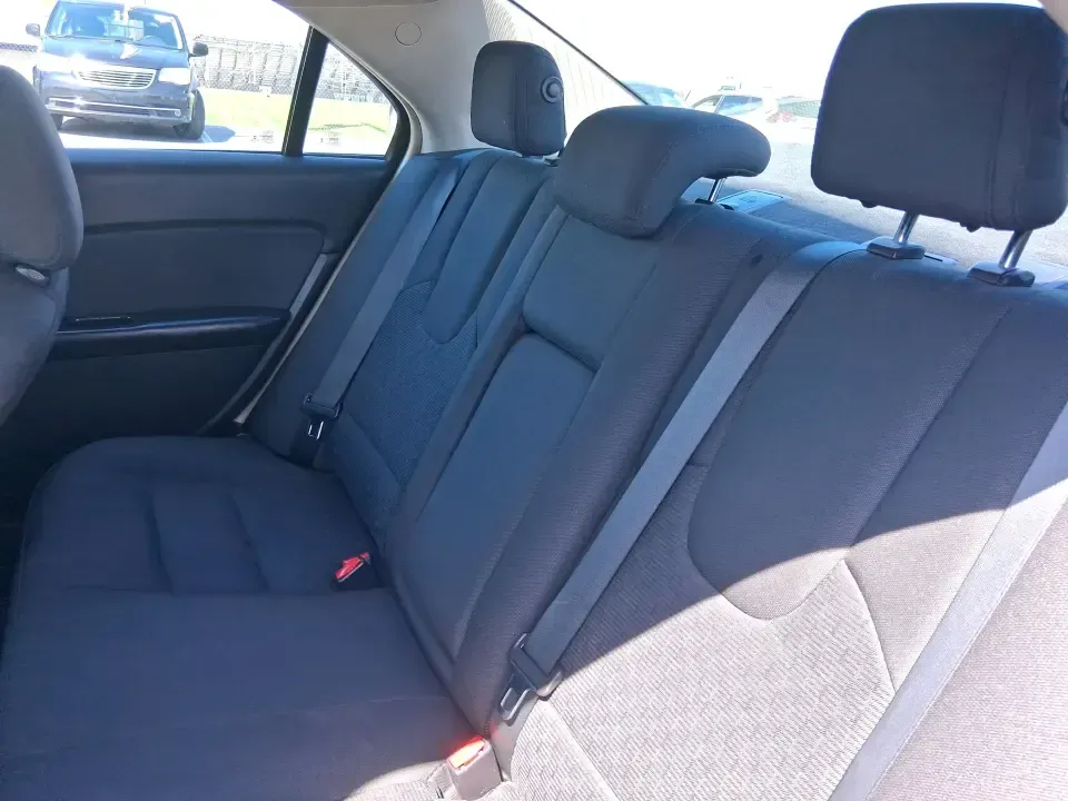 2012 Ford Fusion SE (3FAHP0HAXCR) with an 2.5L L4 DOHC 16V engine, located at 1099 N County Rd 25A, Troy, OH, 45373, (937) 908-9800, 40.057079, -84.212883 - Need a dependable sedan that makes everyday life easier-whether you're commuting down I-75 to Dayton, running errands around Troy, or planning a weekend drive past the Miami River and downtown's shops and festivals? This 2012 Ford Fusion SE in Blue Flame Metallic is a smart, comfortable choice for b - Photo#10