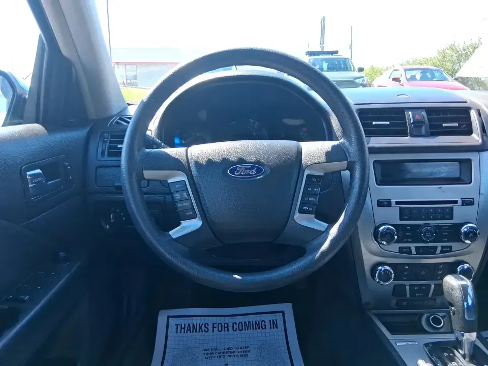 2012 Ford Fusion SE (3FAHP0HAXCR) with an 2.5L L4 DOHC 16V engine, located at 1099 N County Rd 25A, Troy, OH, 45373, (937) 908-9800, 40.057079, -84.212883 - Need a dependable sedan that makes everyday life easier-whether you're commuting down I-75 to Dayton, running errands around Troy, or planning a weekend drive past the Miami River and downtown's shops and festivals? This 2012 Ford Fusion SE in Blue Flame Metallic is a smart, comfortable choice for b - Photo#16