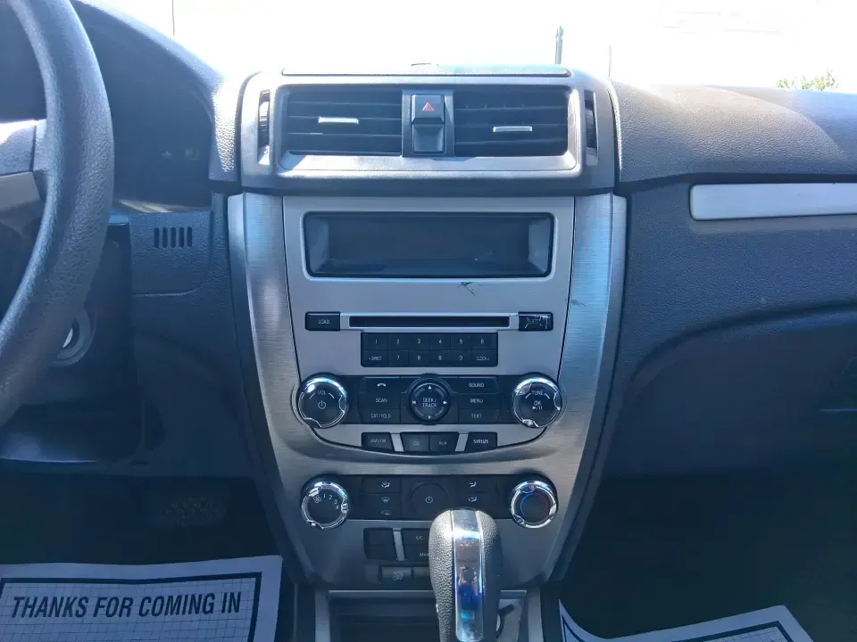 2012 Ford Fusion SE (3FAHP0HAXCR) with an 2.5L L4 DOHC 16V engine, located at 8750 N County Rd 25A, Piqua, OH, 45356, (937) 908-9800, 40.164391, -84.232513 - Need a dependable sedan that makes everyday life easier-whether you're commuting down I-75 to Dayton, running errands around Troy, or planning a weekend drive past the Miami River and downtown's shops and festivals? This 2012 Ford Fusion SE in Blue Flame Metallic is a smart, comfortable choice for b - Photo#13