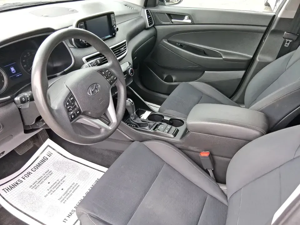 2019 Hyundai Tucson SE (KM8J23A41KU) with an Nu 2L I-4 gasoline direct injection engine, 6A transmission, located at 8750 N County Rd 25A, Piqua, OH, 45356, (937) 908-9800, 40.164391, -84.232513 - Need a practical SUV that can handle the daily school run, a long commute up I75, and weekend trips to the Miami Valley without draining your budget? This 2019 Hyundai Tucson SE in eye-catching Dusk Blue is built for real life in Piqua, Ohio-easy to park, comfortable for passengers, and ready for ev - Photo#9