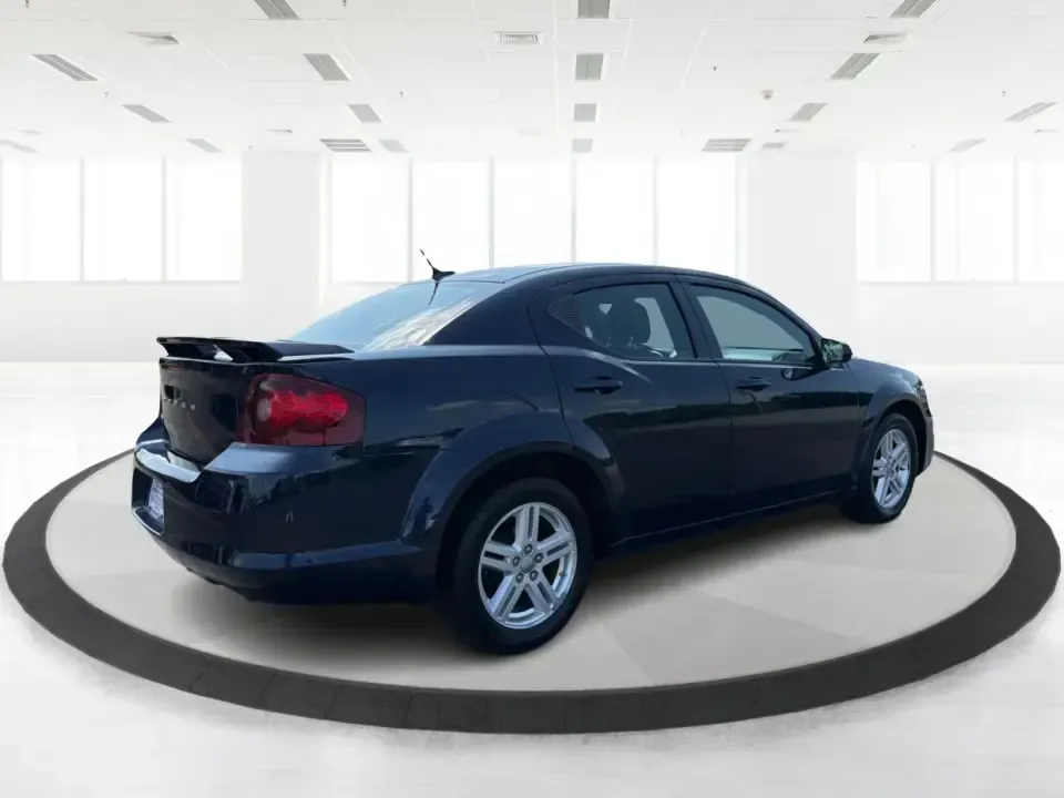 2014 Dodge Avenger SE (1C3CDZAG6EN) with an 3.6L V6 DOHC 24V FFV engine, 6-Speed Automatic transmission, located at 401 Woodman Dr, Riverside, OH, 45431, (937) 908-9800, 39.760899, -84.123421 - Need a comfortable, budget-friendly sedan that can handle the daily grind from Riverside to Downtown Dayton, quick school drop-offs, and the occasional weekend escape to Carillon Historical Park or a lap around the National Museum of the U.S. Air Force? This 2014 Dodge Avenger SE in eye-catching Tru- Photo#2
