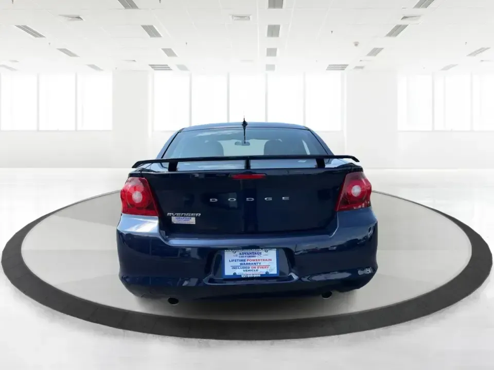 2014 Dodge Avenger SE (1C3CDZAG6EN) with an 3.6L V6 DOHC 24V FFV engine, 6-Speed Automatic transmission, located at 401 Woodman Dr, Riverside, OH, 45431, (937) 908-9800, 39.760899, -84.123421 - Need a comfortable, budget-friendly sedan that can handle the daily grind from Riverside to Downtown Dayton, quick school drop-offs, and the occasional weekend escape to Carillon Historical Park or a lap around the National Museum of the U.S. Air Force? This 2014 Dodge Avenger SE in eye-catching Tru- Photo#3