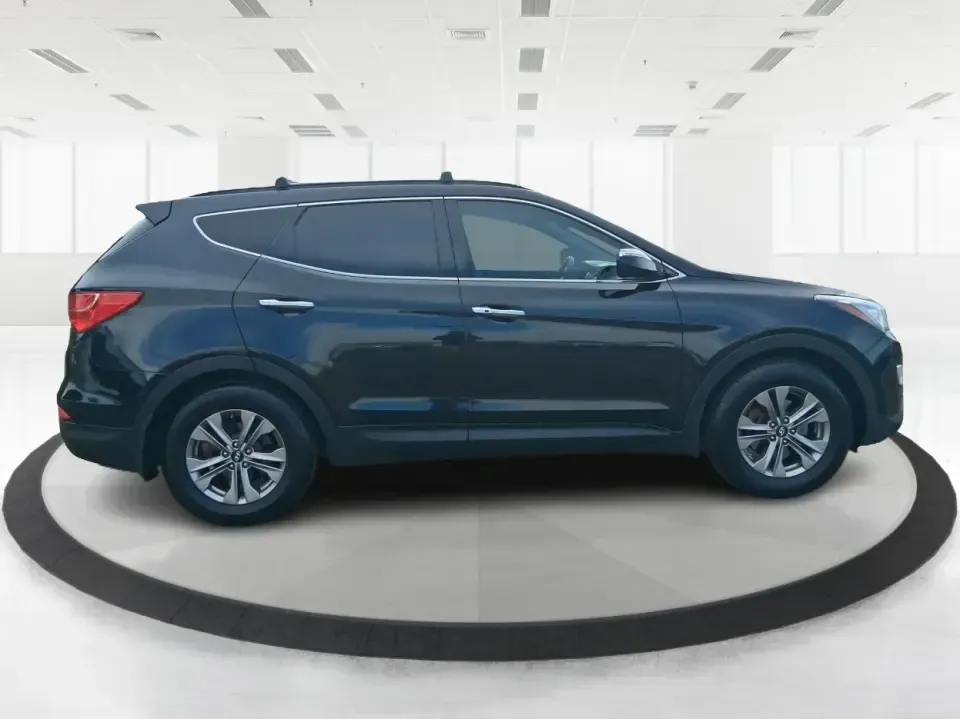 2015 Hyundai Santa Fe 2.4L (5XYZU3LB1FG) with an Theta II 2.4L I-4 gasoline direct injection engine, 6-Speed Automatic transmission, located at 1099 N County Rd 25A, Troy, OH, 45373, (937) 908-9800, 40.057079, -84.212883 - Pack up the kids for a weekend at Treasure Island Park, load the cooler for a day on the Great Miami River, or settle into a comfortable daily commute down I75-this 2015 Hyundai Santa Fe 2.4L is the kind of practical SUV that fits real life in Troy. With confident road manners, flexible cargo space, - Photo#1