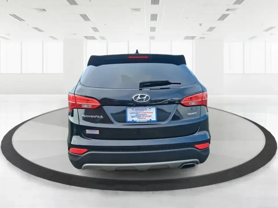 2015 Hyundai Santa Fe 2.4L (5XYZU3LB1FG) with an Theta II 2.4L I-4 gasoline direct injection engine, 6-Speed Automatic transmission, located at 1099 N County Rd 25A, Troy, OH, 45373, (937) 908-9800, 40.057079, -84.212883 - Pack up the kids for a weekend at Treasure Island Park, load the cooler for a day on the Great Miami River, or settle into a comfortable daily commute down I75-this 2015 Hyundai Santa Fe 2.4L is the kind of practical SUV that fits real life in Troy. With confident road manners, flexible cargo space, - Photo#3