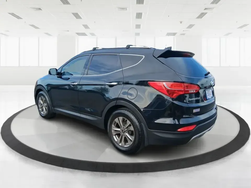 2015 Hyundai Santa Fe 2.4L (5XYZU3LB1FG) with an Theta II 2.4L I-4 gasoline direct injection engine, 6-Speed Automatic transmission, located at 1099 N County Rd 25A, Troy, OH, 45373, (937) 908-9800, 40.057079, -84.212883 - Pack up the kids for a weekend at Treasure Island Park, load the cooler for a day on the Great Miami River, or settle into a comfortable daily commute down I75-this 2015 Hyundai Santa Fe 2.4L is the kind of practical SUV that fits real life in Troy. With confident road manners, flexible cargo space, - Photo#4
