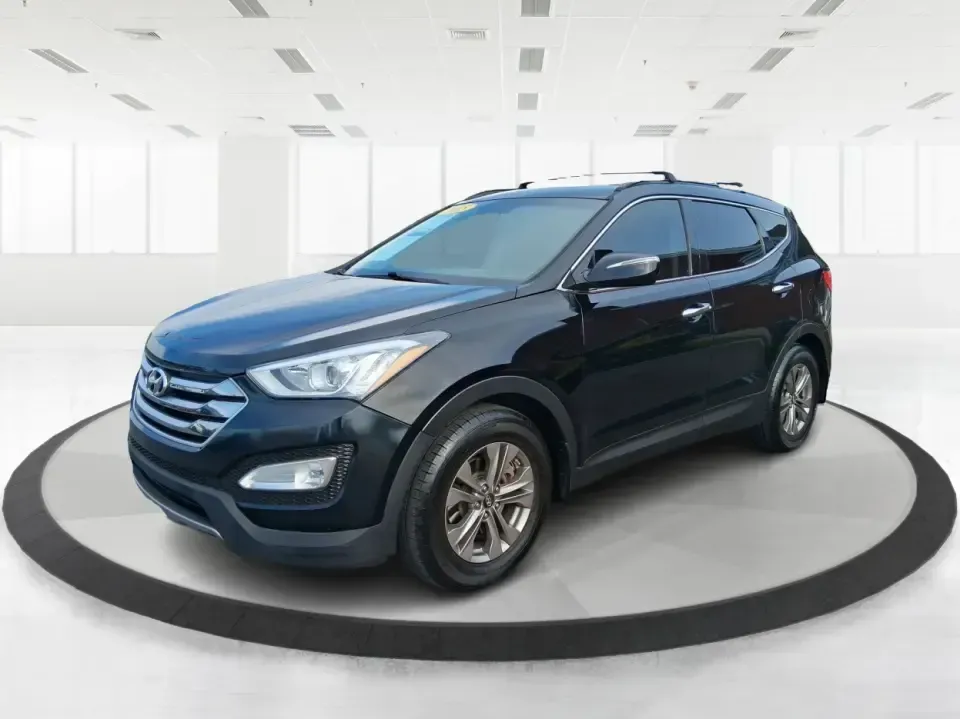2015 Hyundai Santa Fe 2.4L (5XYZU3LB1FG) with an Theta II 2.4L I-4 gasoline direct injection engine, 6-Speed Automatic transmission, located at 1099 N County Rd 25A, Troy, OH, 45373, (937) 908-9800, 40.057079, -84.212883 - Pack up the kids for a weekend at Treasure Island Park, load the cooler for a day on the Great Miami River, or settle into a comfortable daily commute down I75-this 2015 Hyundai Santa Fe 2.4L is the kind of practical SUV that fits real life in Troy. With confident road manners, flexible cargo space, - Photo#8