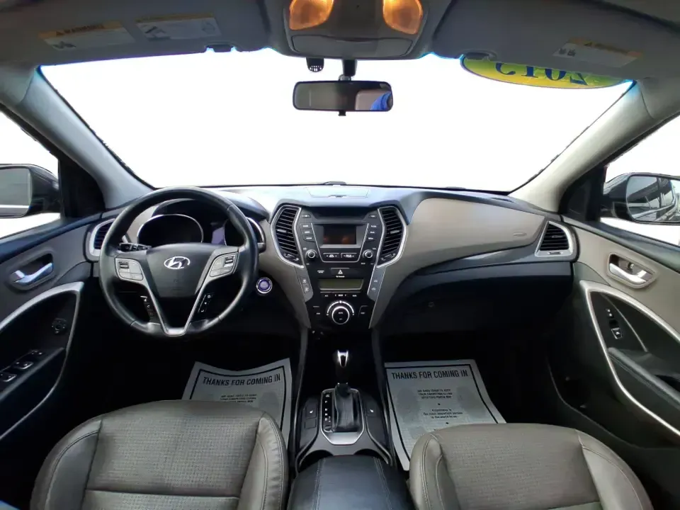 2015 Hyundai Santa Fe 2.4L (5XYZU3LB1FG) with an Theta II 2.4L I-4 gasoline direct injection engine, 6-Speed Automatic transmission, located at 1099 N County Rd 25A, Troy, OH, 45373, (937) 908-9800, 40.057079, -84.212883 - Pack up the kids for a weekend at Treasure Island Park, load the cooler for a day on the Great Miami River, or settle into a comfortable daily commute down I75-this 2015 Hyundai Santa Fe 2.4L is the kind of practical SUV that fits real life in Troy. With confident road manners, flexible cargo space, - Photo#20