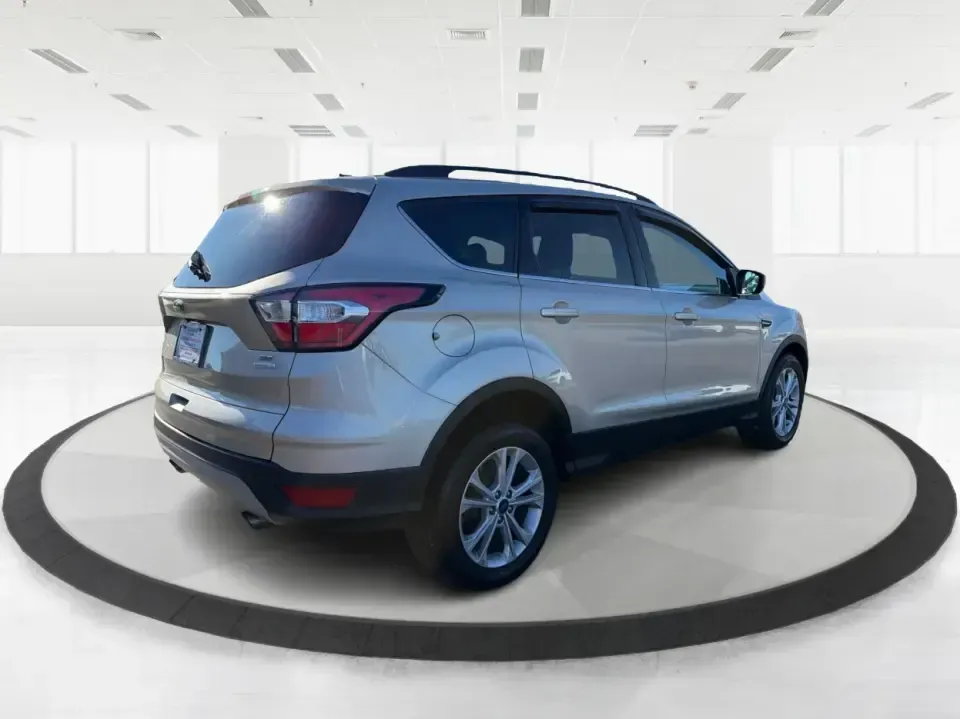 2018 Ford Escape SE (1FMCU0GD6JU) with an 1.5L L4 DOHC 16V engine, 6A transmission, located at 4508 South Dixie Dr, Moraine, OH, 45439, (937) 908-9800, 39.689976, -84.218452 - Pack up the kids, load the groceries, or point the nose toward a weekend getaway-this 2018 Ford Escape SE is the kind of compact SUV that fits real life in Moraine. With a comfortable cabin, smart tech, and easy-to-park size, it's ideal for long commutes up I75, quick errands along South Dixie Dr, o - Photo#2