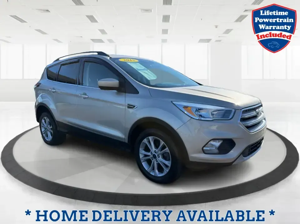 2018 Ford Escape SE FWD (1FMCU0GD6JU) with an 1.5L L4 DOHC 16V engine, 6A transmission, located at 1099 N County Rd 25A, Troy, OH, 45373, (937) 908-9800, 40.057079, -84.212883 - Weekday commute down I75, school drop-offs, and spontaneous weekend getaways to Charleston Falls Preserve all get easier in a compact SUV that fits real life. This 2018 Ford Escape SE FWD is a smart pick for Troy, Ohio drivers who want SUV versatility without the bulk-easy to park near downtown Troy- Photo#0