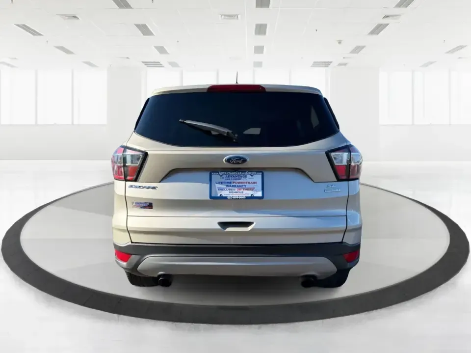 2018 Ford Escape SE FWD (1FMCU0GD6JU) with an 1.5L L4 DOHC 16V engine, 6A transmission, located at 1099 N County Rd 25A, Troy, OH, 45373, (937) 908-9800, 40.057079, -84.212883 - Weekday commute down I75, school drop-offs, and spontaneous weekend getaways to Charleston Falls Preserve all get easier in a compact SUV that fits real life. This 2018 Ford Escape SE FWD is a smart pick for Troy, Ohio drivers who want SUV versatility without the bulk-easy to park near downtown Troy- Photo#3