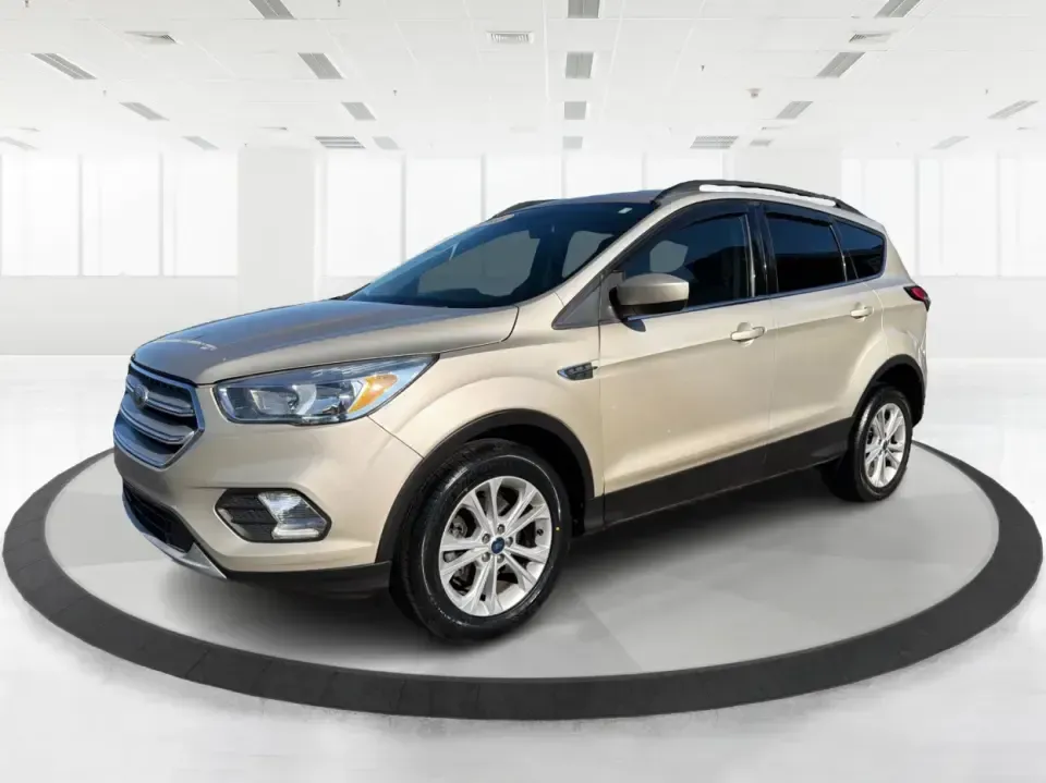 2018 Ford Escape SE FWD (1FMCU0GD6JU) with an 1.5L L4 DOHC 16V engine, 6A transmission, located at 1099 N County Rd 25A, Troy, OH, 45373, (937) 908-9800, 40.057079, -84.212883 - Weekday commute down I75, school drop-offs, and spontaneous weekend getaways to Charleston Falls Preserve all get easier in a compact SUV that fits real life. This 2018 Ford Escape SE FWD is a smart pick for Troy, Ohio drivers who want SUV versatility without the bulk-easy to park near downtown Troy- Photo#8