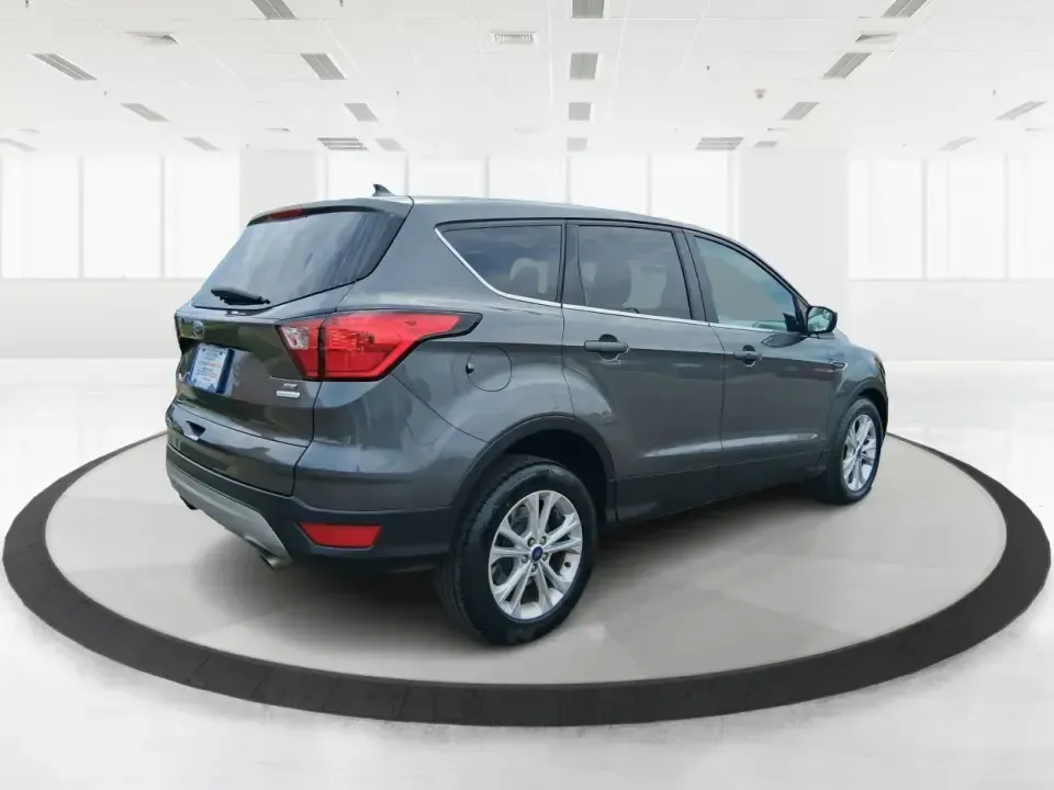 2019 Ford Escape SE (1FMCU0GD6KU) with an 1.5L L4 DOHC 16V engine, 6A transmission, located at 401 Woodman Dr, Riverside, OH, 45431, (937) 908-9800, 39.760899, -84.123421 - Weekday commutes down Woodman Dr, school drop-offs, and weekend getaways to Carillon Historical Park or a quick run up I675-this 2019 Ford Escape SE is the kind of SUV that fits real life in Riverside, Ohio. With its easy-to-park size, confident road manners, and versatile cargo space, it's a smart - Photo#2