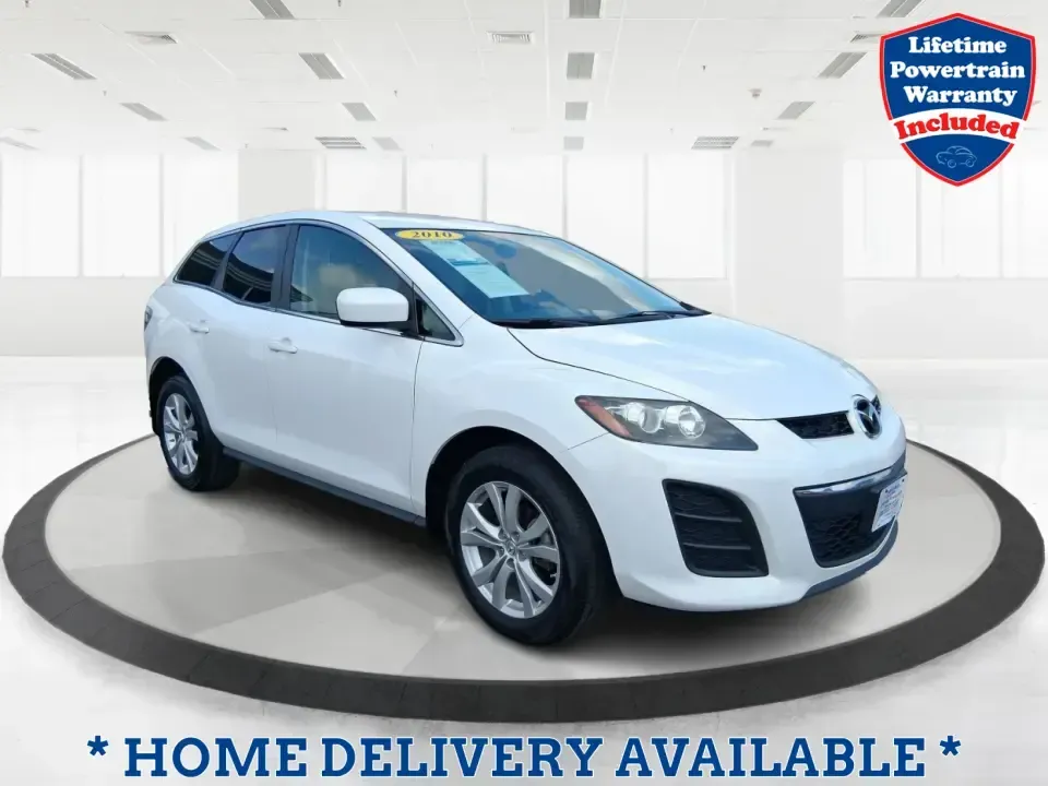 2010 Mazda CX-7 s Touring (JM3ER4W33A0) with an 2.3L I-4 gasoline direct injection engine, 6-Speed Automatic transmission, located at 1099 N County Rd 25A, Troy, OH, 45373, (937) 908-9800, 40.057079, -84.212883 - Picture your next weekend: loading up the cargo area for a day at Miami County Park, cruising up I75 for a quick getaway, or confidently handling Ohio's surprise rain and winter slush on the school run. This 2010 Mazda CX7 s Touring is the kind of sporty, practical SUV that fits real life in Troy-ea - Photo#0