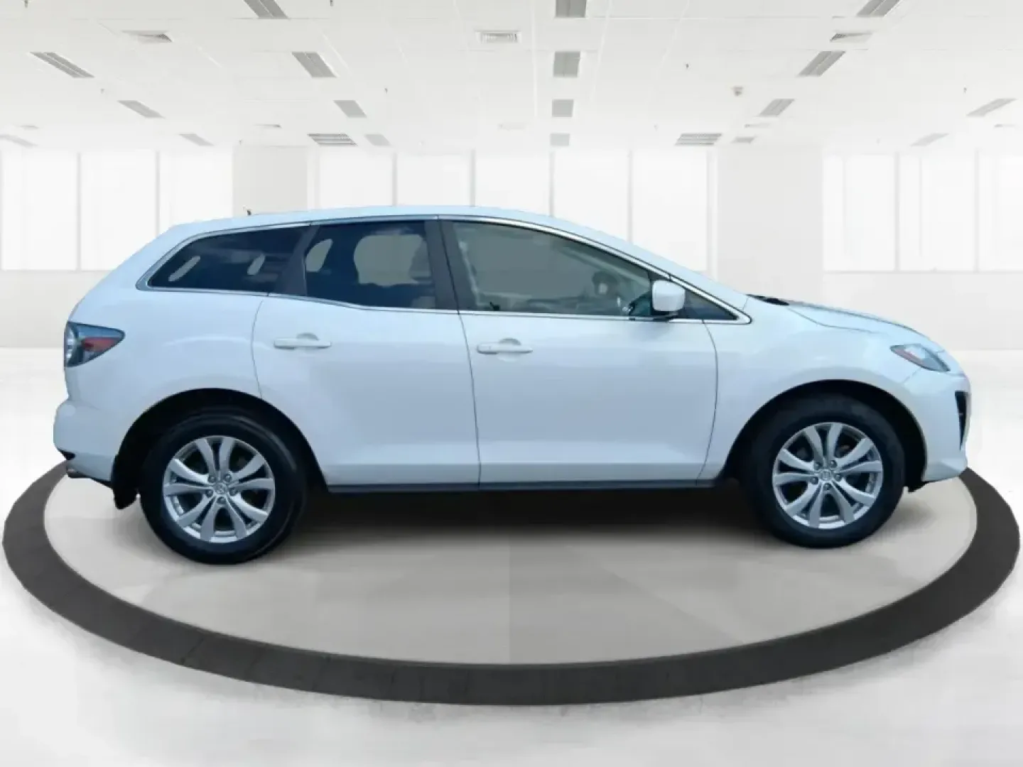 2010 Mazda CX-7 s Touring (JM3ER4W33A0) with an 2.3L I-4 gasoline direct injection engine, 6-Speed Automatic transmission, located at 8750 N County Rd 25A, Piqua, OH, 45356, (937) 908-9800, 40.164391, -84.232513 - Picture your next weekend: loading up the cargo area for a day at Miami County Park, cruising up I75 for a quick getaway, or confidently handling Ohio's surprise rain and winter slush on the school run. This 2010 Mazda CX7 s Touring is the kind of sporty, practical SUV that fits real life in Troy-ea - Photo#1