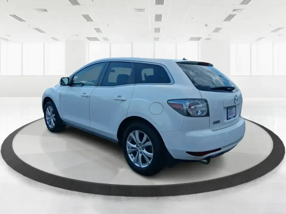 2010 Mazda CX-7 s Touring (JM3ER4W33A0) with an 2.3L I-4 gasoline direct injection engine, 6-Speed Automatic transmission, located at 1099 N County Rd 25A, Troy, OH, 45373, (937) 908-9800, 40.057079, -84.212883 - Picture your next weekend: loading up the cargo area for a day at Miami County Park, cruising up I75 for a quick getaway, or confidently handling Ohio's surprise rain and winter slush on the school run. This 2010 Mazda CX7 s Touring is the kind of sporty, practical SUV that fits real life in Troy-ea - Photo#4