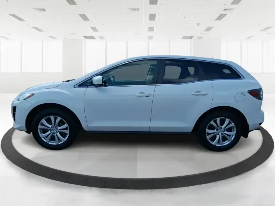 2010 Mazda CX-7 s Touring (JM3ER4W33A0) with an 2.3L I-4 gasoline direct injection engine, 6-Speed Automatic transmission, located at 1099 N County Rd 25A, Troy, OH, 45373, (937) 908-9800, 40.057079, -84.212883 - Picture your next weekend: loading up the cargo area for a day at Miami County Park, cruising up I75 for a quick getaway, or confidently handling Ohio's surprise rain and winter slush on the school run. This 2010 Mazda CX7 s Touring is the kind of sporty, practical SUV that fits real life in Troy-ea - Photo#5