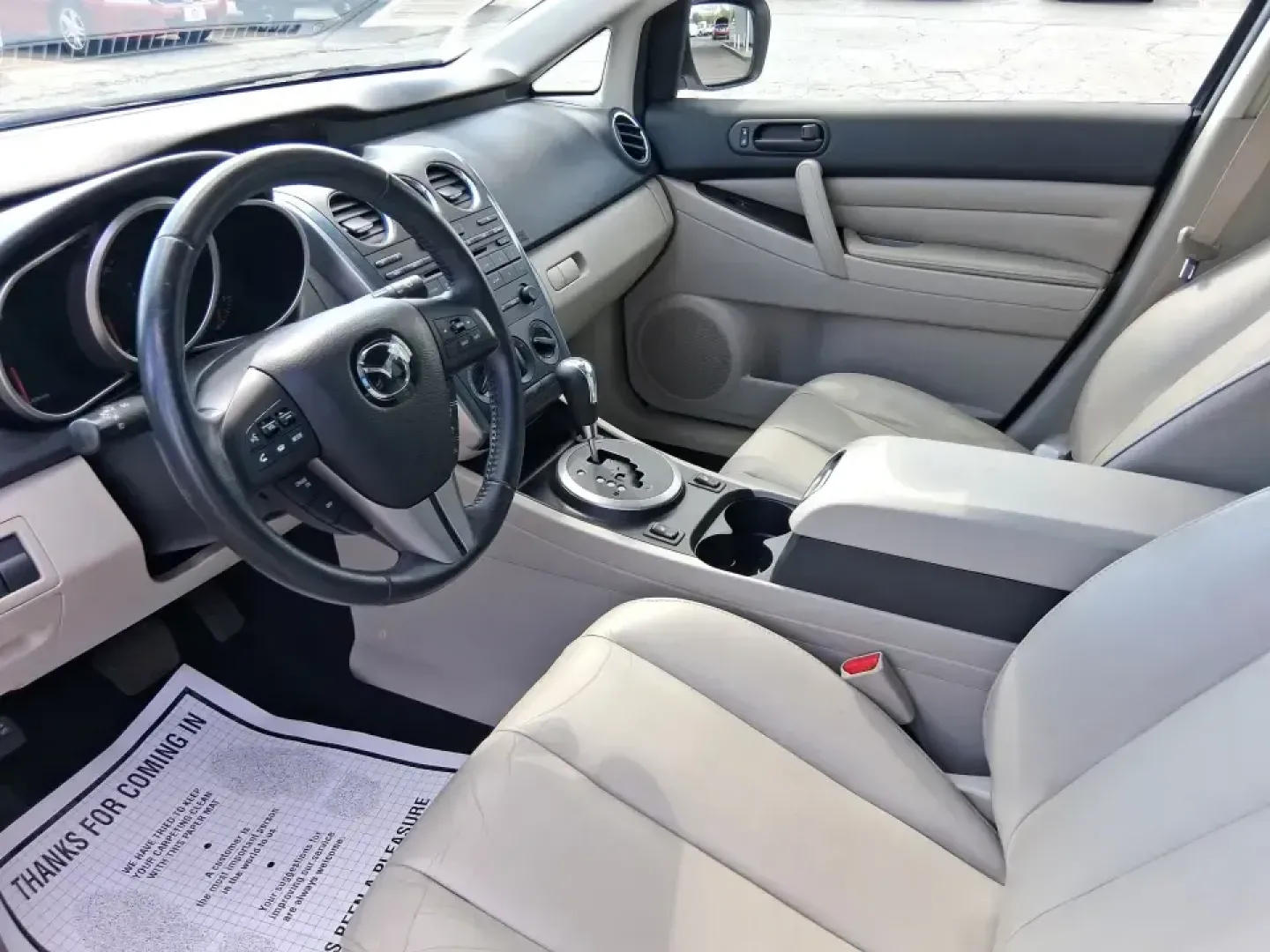 2010 Mazda CX-7 s Touring (JM3ER4W33A0) with an 2.3L I-4 gasoline direct injection engine, 6-Speed Automatic transmission, located at 8750 N County Rd 25A, Piqua, OH, 45356, (937) 908-9800, 40.164391, -84.232513 - Picture your next weekend: loading up the cargo area for a day at Miami County Park, cruising up I75 for a quick getaway, or confidently handling Ohio's surprise rain and winter slush on the school run. This 2010 Mazda CX7 s Touring is the kind of sporty, practical SUV that fits real life in Troy-ea - Photo#9