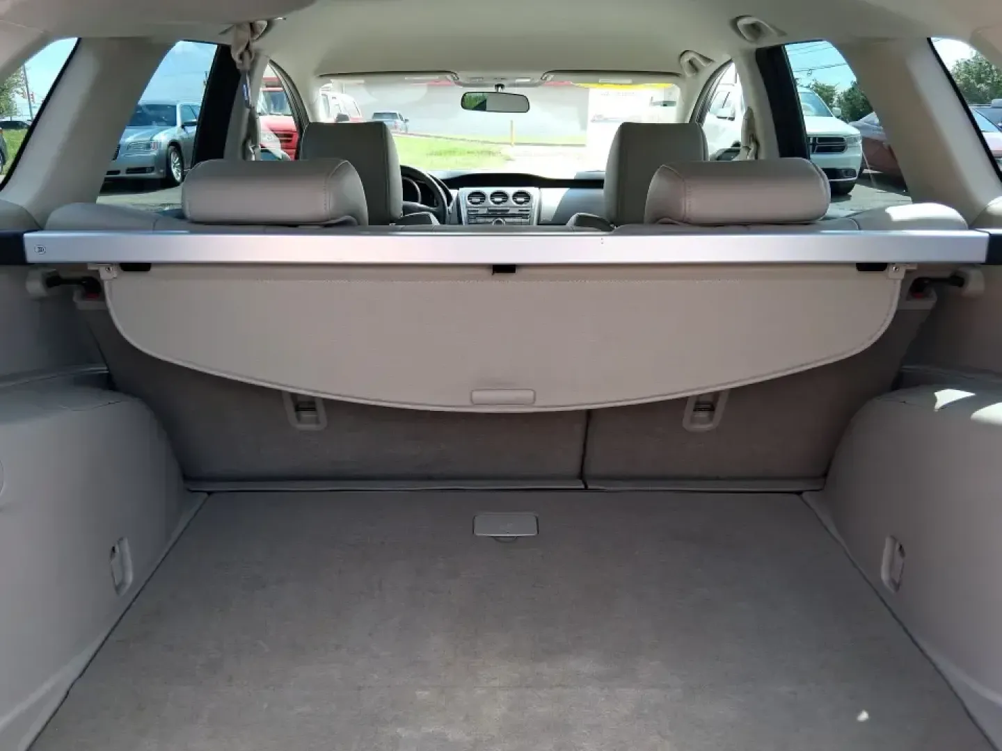 2010 Mazda CX-7 s Touring (JM3ER4W33A0) with an 2.3L I-4 gasoline direct injection engine, 6-Speed Automatic transmission, located at 8750 N County Rd 25A, Piqua, OH, 45356, (937) 908-9800, 40.164391, -84.232513 - Picture your next weekend: loading up the cargo area for a day at Miami County Park, cruising up I75 for a quick getaway, or confidently handling Ohio's surprise rain and winter slush on the school run. This 2010 Mazda CX7 s Touring is the kind of sporty, practical SUV that fits real life in Troy-ea - Photo#12