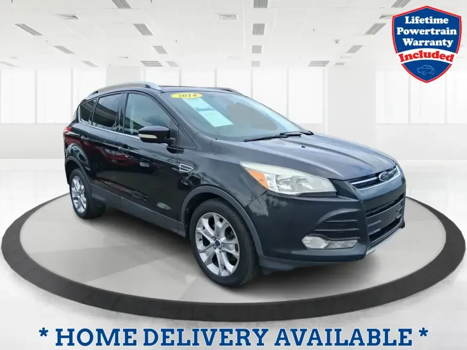 2014 Ford Escape Titanium (1FMCU9J99EU) with an 2.0L L4 DOHC 16V engine, 6-Speed Automatic transmission, located at 1099 N County Rd 25A, Troy, OH, 45373, (937) 908-9800, 40.057079, -84.212883 - Need one SUV that can handle an Ohio winter commute, school drop-offs, and a spontaneous weekend road trip to Hocking Hills without feeling like a compromise? This 2014 Ford Escape Titanium 4WD in sleek Tuxedo Black is built for real life in Troy-comfortable for long drives, confident in bad weather - Photo#0