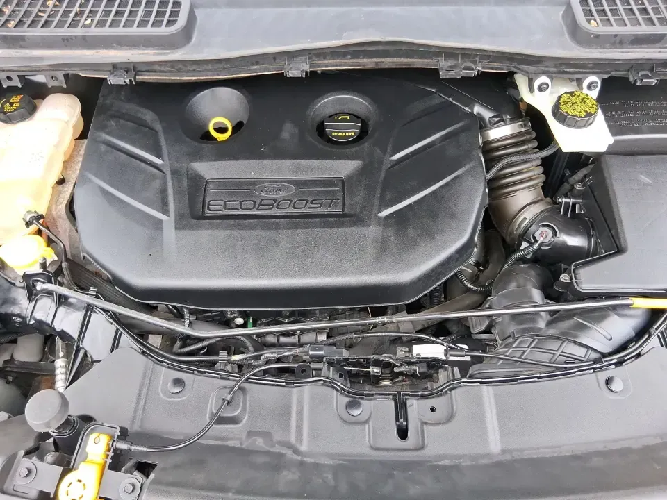 2014 Ford Escape Titanium (1FMCU9J99EU) with an 2.0L L4 DOHC 16V engine, 6-Speed Automatic transmission, located at 1099 N County Rd 25A, Troy, OH, 45373, (937) 908-9800, 40.057079, -84.212883 - Need one SUV that can handle an Ohio winter commute, school drop-offs, and a spontaneous weekend road trip to Hocking Hills without feeling like a compromise? This 2014 Ford Escape Titanium 4WD in sleek Tuxedo Black is built for real life in Troy-comfortable for long drives, confident in bad weather - Photo#11