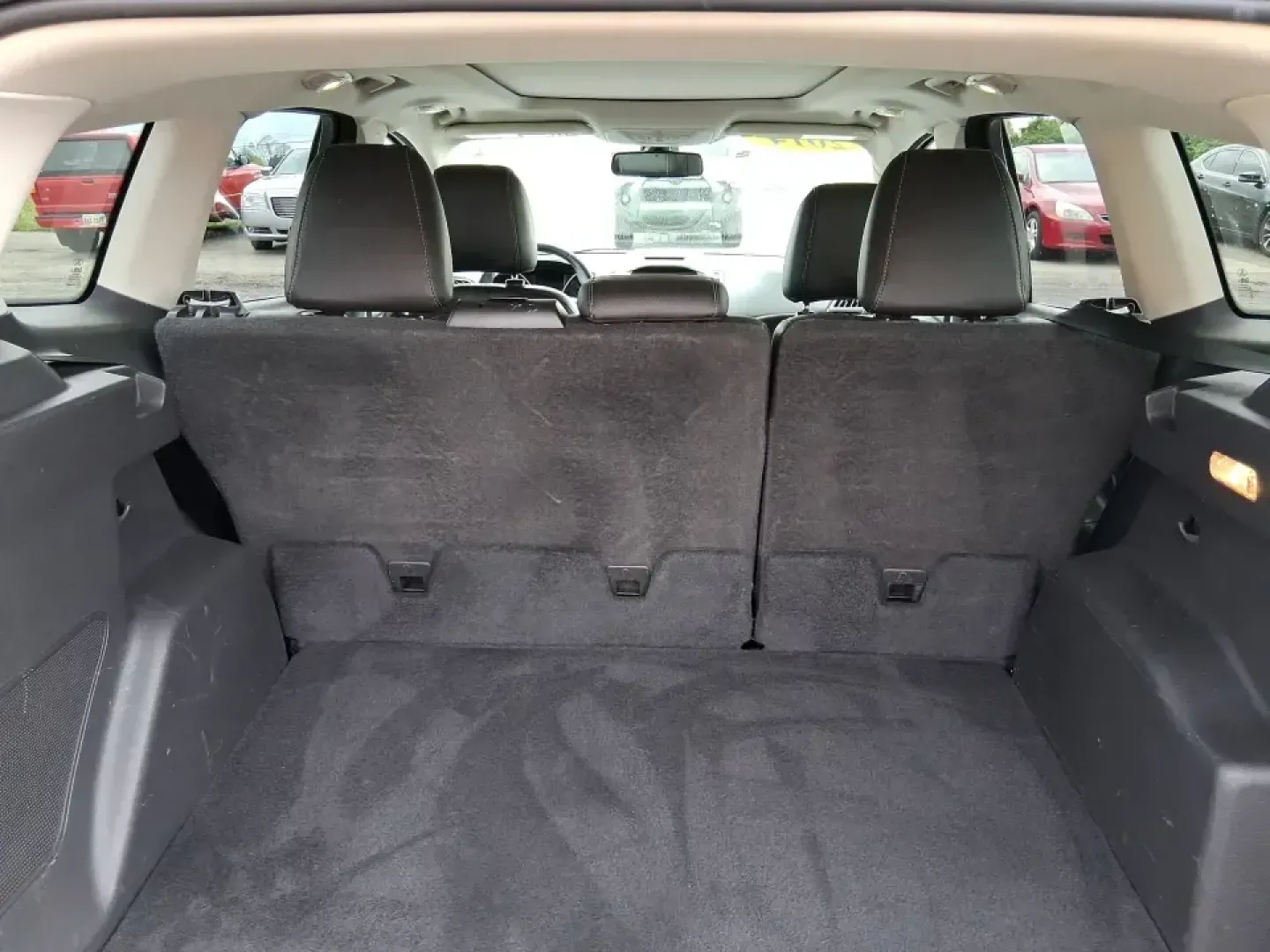 2014 Ford Escape Titanium (1FMCU9J99EU) with an 2.0L L4 DOHC 16V engine, 6-Speed Automatic transmission, located at 1099 N County Rd 25A, Troy, OH, 45373, (937) 908-9800, 40.057079, -84.212883 - Need one SUV that can handle an Ohio winter commute, school drop-offs, and a spontaneous weekend road trip to Hocking Hills without feeling like a compromise? This 2014 Ford Escape Titanium 4WD in sleek Tuxedo Black is built for real life in Troy-comfortable for long drives, confident in bad weather - Photo#12