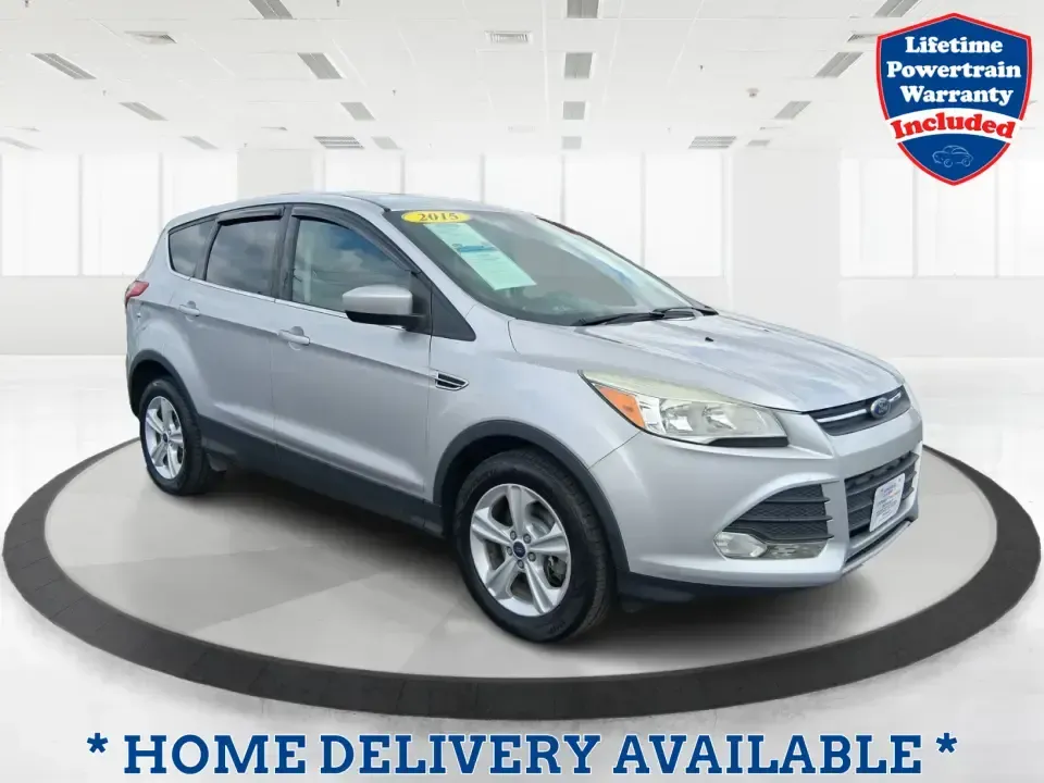 2015 Ford Escape SE (1FMCU9G91FU) with an 2.0L L4 DOHC 16V engine, 6-Speed Automatic transmission, located at 880 E. National Road, Vandalia, OH, 45377, (937) 908-9800, 39.891918, -84.183594 - Weekend getaways to Englewood MetroPark, snowy commutes down I75, and everyday school-and-grocery runs all feel easier when you've got an SUV that's sized right, confident in bad weather, and comfortable for the long haul. This **2015 Ford Escape SE 4WD** in **Ingot Silver** is a smart pick for driv - Photo#0