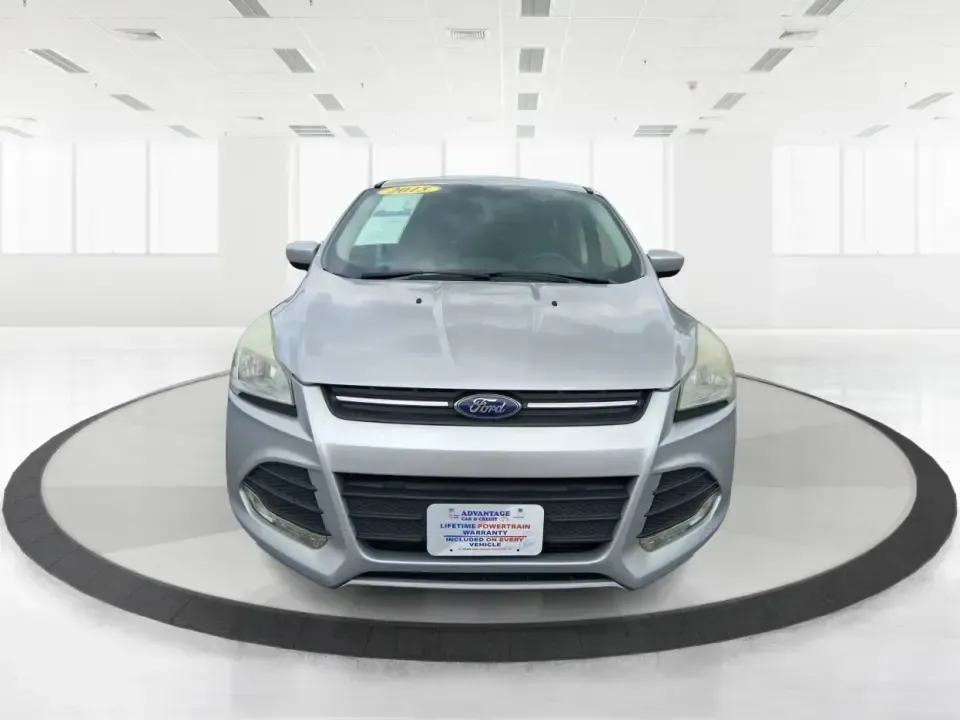 2015 Ford Escape SE (1FMCU9G91FU) with an 2.0L L4 DOHC 16V engine, 6-Speed Automatic transmission, located at 880 E. National Road, Vandalia, OH, 45377, (937) 908-9800, 39.891918, -84.183594 - Weekend getaways to Englewood MetroPark, snowy commutes down I75, and everyday school-and-grocery runs all feel easier when you've got an SUV that's sized right, confident in bad weather, and comfortable for the long haul. This **2015 Ford Escape SE 4WD** in **Ingot Silver** is a smart pick for driv - Photo#7