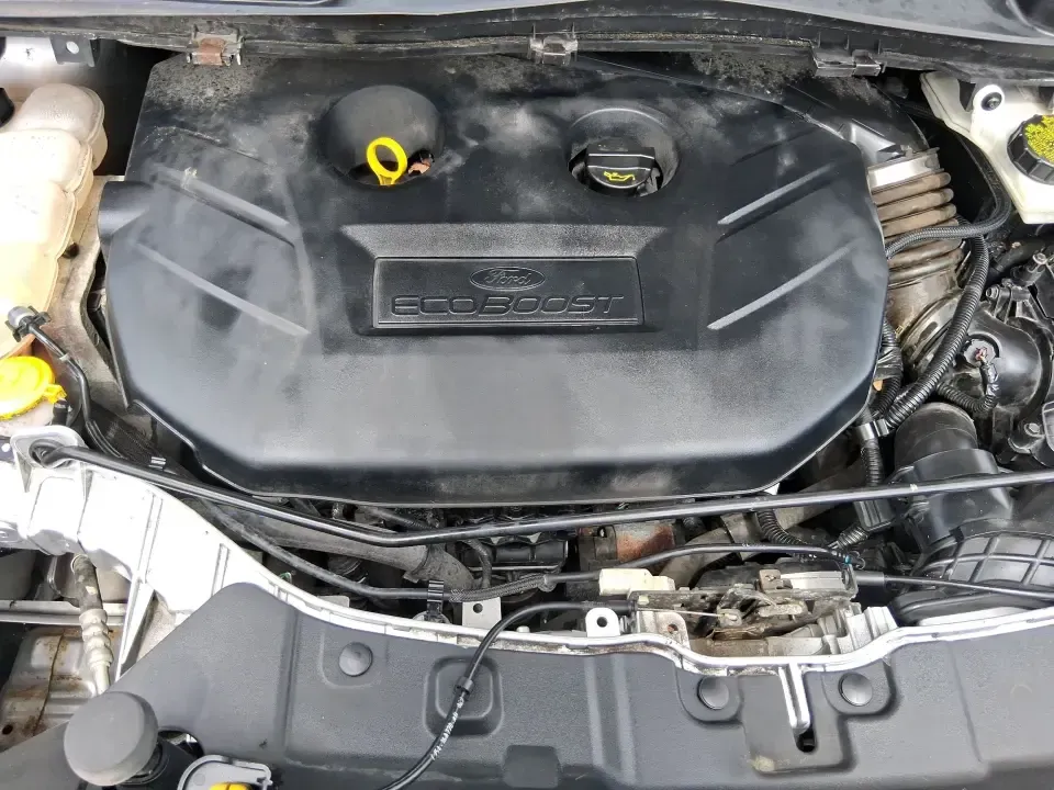 2015 Ford Escape SE (1FMCU9G91FU) with an 2.0L L4 DOHC 16V engine, 6-Speed Automatic transmission, located at 880 E. National Road, Vandalia, OH, 45377, (937) 908-9800, 39.891918, -84.183594 - Weekend getaways to Englewood MetroPark, snowy commutes down I75, and everyday school-and-grocery runs all feel easier when you've got an SUV that's sized right, confident in bad weather, and comfortable for the long haul. This **2015 Ford Escape SE 4WD** in **Ingot Silver** is a smart pick for driv - Photo#11